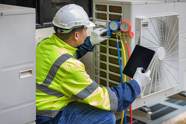 Professional Furnace Repair technician working in Central City, IL